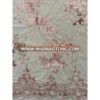 Cheap beautiful New design 3MM net mesh rose gold sequin fabric for dress